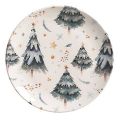 a white plate with christmas trees on it