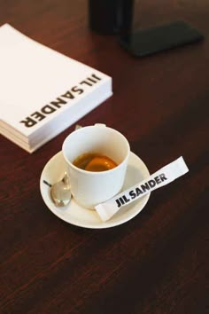 a cup of tea sitting on top of a saucer