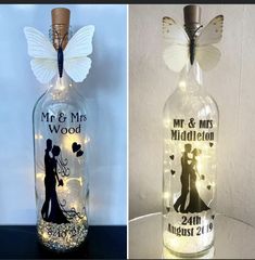 a bottle that has some lights in it and a photo on the inside of it