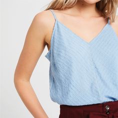 stripe textured v-neck camisole top details: stripe textured polyester, v-neck, adjustable shoulder strap, lined material: 100% polyester model details: 5'7" and wearing a size small Stripes Texture, Camisole Top, Shoulder Strap, Light Blue, V Neck, Texture, How To Wear, Blue