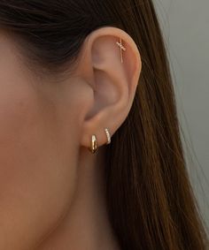 Truly perfect in any piercing location. These unique studs brighten your face and elevate your ears. Safe for sensitive skin, our pieces are hand crafted and made to wear 24/7. Solid 14k gold with 5 natural diamonds (.026 cw). Measures 5mm x 13mm. Available as a single stud or in a pair. These earrings come with our signature mini push-on butterfly backings for the most hygienic and comfortable fit. Less metal behind your ears means less build-up and more room for multiple piercings close togeth Unique Studs, Hair Cuffs, Multiple Piercings, Chain Anklet, Diamond Stud, Diamond Studs, Ring Bracelet, Ear Piercings, Anklets