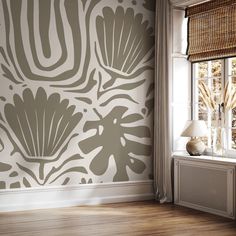 the wall paper in this room is designed to look like an art deco design,