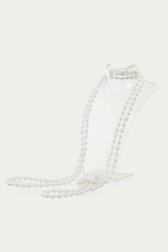 This sumptuous piece of jewelry features a retro-elegant yet slightly modern style that complements the lavish garments, reminiscent of the roaring 1920s. Features: Lustrous imitation pearls Minimalist design 69 inch / 175cm long Pearl size: 8mm in diameter Elegant Evening Backdrop Necklace With Pearl Chain, Elegant Pearl Chain Backdrop Necklace For Evening, Elegant Pearl White Backdrop Necklace For Party, Elegant Pearl Backdrop Necklace For Party, Long Pearl White Pearl Necklace For Party, Classic Long Necklaces For Party, Elegant Pearl Backdrop Necklace For Formal Occasions, White Elegant Formal Backdrop Necklace, White Elegant Backdrop Necklace For Formal Occasions