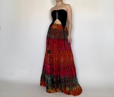 Beautiful tie dye maxi skirt. Each one of these skirts is slightly unique due to handmade nature. Waist stretches from 24' to 31' comfortably Measurements: Inseam: 35' Waist: 24' to 31' Red Fitted Maxi Skirt For Beach, Red Bohemian Maxi Skirt, Red Flowy Hippie Maxi Skirt, Flowy Red Maxi Skirt In Hippie Style, Red Flowy Maxi Skirt In Hippie Style, Red Hippie Style Flowy Maxi Skirt, Hippie Style Fitted Maxi Skirt For Vacation, Red Hippie Flowy Maxi Skirt, Red Bohemian Maxi Skirt For Festival