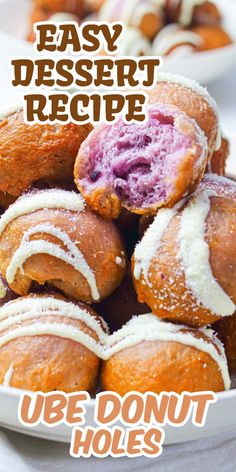 a white plate topped with donuts covered in icing