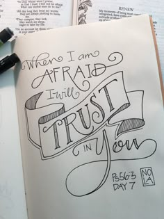 an open bible with the words when i am afraid to trust trust in you