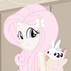 a pink pony holding a small white rabbit