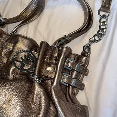 Micheal Kors Bronzer Metallic Purse With Silver Accents. Originally $498 Tag Price. Smoke And Pet Free Home. Stored In Duster Bag. No Tears/Flaws Metallic Purse, No Tears, Silver Accents, Bronzer, Michael Kors, Bag Lady, Purse, Pet, Silver