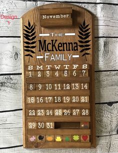 a wooden calendar is hanging on the wall