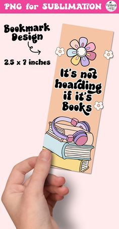 a hand holding up a bookmark with the words it's not hard to read if