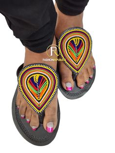 African Sandals. Made using high quality leather And beads. Traditional Round Toe Sandals For Beach, Bohemian Open Heel Sandals For Beach, Handmade Sandals With Open Heel, Multicolor Toe Loop Sandals For Vacation, Traditional Black Sandals For The Beach, Traditional Black Flip Flops For Vacation, Casual Black Beaded Sandals, Maasai Sandals Kenya, Handmade Black Flip Flops