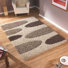 a living room with a rug on the floor