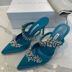 Blue Embellished Heels For Special Events, Blue Embellished Heels For Gala, Embellished Blue Heels For Gala, Hand Embellished Elegant Heels, Elegant Hand-embellished Heels, Luxury Blue Heels With Rhinestones, Hand Embellished Heels For Party, Hand Embellished Heels For Evening, Luxury Embellished Blue Heels