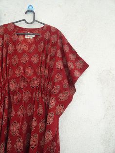 "Its  a pure hand block print and pure cotton material kaftan . It is made of 100 % cotton material . Great for summers. Size -  1---FIRST SIZE -----       WIDTH --      60 INCH        LENGTH --   57 INCH         NECK --        8 INCH         If any alteration is required please contact seller.        Pure cotton fabric. 2---SECOND SIZE ------       WIDTH --    70 INCH       LENGTH--   57 INCH        NECK --       8 INCH        If any alteration is required please contact seller.       Pure cott Flowy Red Printed Kaftan, Red Bohemian Maxi Dress With Batik Print, Red Tunic Kurta For Festival, Red Festival Tunic Kurta, Red Tunic Kaftan For Festivals, Red Flowy Kaftan With Kimono Sleeves, Red Block Print Maxi Dress For Beach, Red Maxi Kaftan For Beach Cover-up, Red Maxi Length Kaftan For Festivals