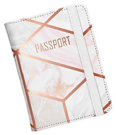 a white passport case with gold foil on the front and side, featuring an abstract marble pattern