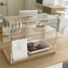 two trays with chocolate brownies in them sitting on a counter next to each other