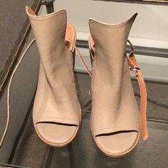 Lucky Brand Women’s Velitina Stacked Heel Open Toe And Back Bootie Size 6.5 Nwot Excellent Condition No Flaws Retail $125 Color: Dune Can Look Grayish Beige Open Toe Open Back Stacked Heel 0.9” Crisscross Strap Rubber Sole Boot Opening Measures Approximately 4.53” Around Leather Boot Bootie Buckle Closure Shaft Measures Approximately Ankle From Arch Extremely Comfortable Neutral Color Can Go With Anything Imprinted Pattern On The Leather For The Lucky Brand Fan! These Booties Are Awesome. They A Beige Leather Heels With Wrapped Heel, Spring Leather Ankle Strap Boots, Leather Boots With Ankle Strap For Spring, Leather Open Toe Boots With Heel Loop, Beige Open Toe Boots Medium Width, Spring Leather Boots With Heel Strap, Beige Stacked Heel Boots For Summer, Beige Heels With Heel Strap For Fall, Leather Boots With Reinforced Open Heel