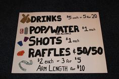 a sign advertising drinks and water in front of a black background with the words drinks pop water shots raffles $ 5 / 50 each