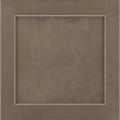 a brown wooden frame with a white border on the top and bottom part of it