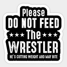 a sign that says please do not feed the wrestler he's cutting weight and may bite