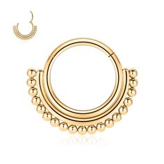 an image of a gold nose ring with balls on the side and a small earring