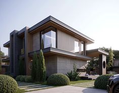 a car is parked in front of a modern house with trees and bushes around it