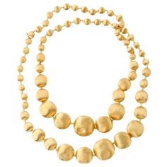 From the Africa collection, this gorgeous Marco Bicego necklace exudes confidence. Boules in various sizes are handcrafted in 18kt yellow gold and set in a graduated pattern into a two-strand necklace. Completely inconspicuous, the clasp keeps this piece streamlined beautifully. With 36" of bold luxury, you'll love this Marco Bicego necklace! Marco Bicego Necklace, Marco Bicego Jewelry, Graduation Jewelry, Graduation Necklace, Marco Bicego, 18k Gold Necklace, Gold Bead Necklace, Yellow Gold Jewelry, Station Necklace