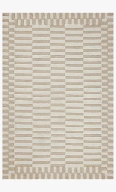 a beige and white rug with vertical stripes