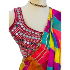 Contemporary multi colored saree that fits any occasion. Ideal as festive wear, wedding wear, casual or cocktail dine in.  this 5.5 meters of elegance as beautiful detailing with exclusive Gota Patti work from Rajasthan to enhance the look. The leightweight and soft material makes it very easy to drape and carry. Comes with very contemporary unstiched blouse material which can be mix and matched with other outfits. Festive Multicolor Chanderi Pre-draped Saree, Navratri Multicolor Pre-draped Saree With Gota Work, Bollywood Style Multicolor Pre-draped Saree For Navratri, Bollywood Multicolor Pre-draped Saree For Navratri, Multicolor Chanderi Pre-draped Saree With Zari Work, Multicolor Choli With Traditional Drape For Party, Multicolor Traditional Drape Choli For Party, Multicolor Choli For Party With Traditional Drape, Bollywood Style Multicolor Choli With Cutdana