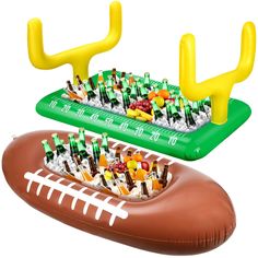 an inflatable football game with snacks on it