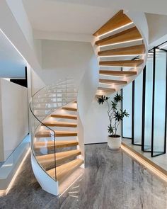 a spiral staircase in the middle of a room