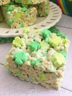 a close up of a slice of cake with green and white frosting on it