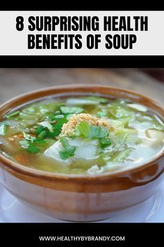 a bowl filled with soup on top of a white plate