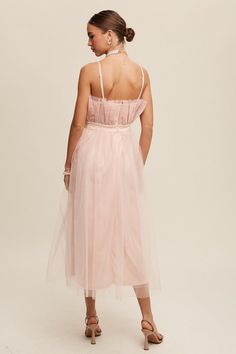 Elegant and versatile, the Frill Tulle Maxi Dress features a removable and adjustable shoulder strap, zip closure, and raw hem for a modern touch. Perfect for special occasions or romantic evenings.- Model is 5' 7.5" 33-24-34 and wearing a size SmallFabric Contents: Self: 100% PolyesterLining: 100% Polyester Size Measurement (inch): S: 15.5 (Bust), 13.5 (Waist) 45.0 (Length) M: 16.0 (Bust), 14.0 (Waist), 45.5 (Length) L: 16.5 (Bust), 14.5 (Waist), , 46.0 (Length) Tulle Midi Dress, Tulle Maxi Dress, Plus Size Swimwear, China Fashion, Classic Silhouette, Sheer Fabrics, Dress Romper, Boho Dress, Color Light