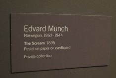 the sign for edward munch is displayed on the wall