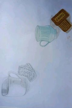 a drawing of a coffee cup next to a computer mouse and keyboard on a white surface