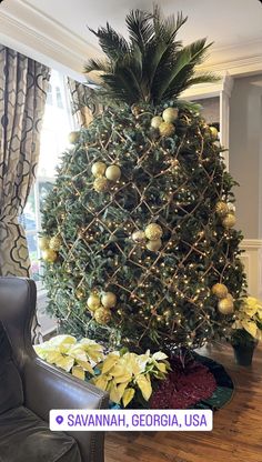 a christmas tree in the middle of a living room