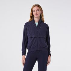 Official FIGS® Outerwear. Get Free Shipping On Orders $50+! | FIGS Womens Navy On-Shift Bomber Jacket™ Navy Casual Weatherproof Windbreaker, Navy Fitted Sporty Outerwear, Sporty Navy Windbreaker With Pockets, Functional Navy Long Sleeve Windbreaker, Sporty Navy Outerwear With Moisture-wicking, Black Figs, Dark Harbor, Black Fig, Shell Jacket