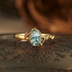 Nature-inspired moss agate engagement ring with gold leaf design Eyes Unique, Floating Water, Vintage Sapphire Ring, Engagement Rings Sale, Moss Agate Engagement Ring, Leaf Engagement Ring, Agate Engagement Ring, Full Eternity Ring, Solid Gold Jewelry