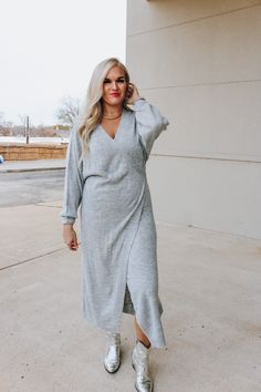 Introducing the must-have for chilly days - our Seasons Best Grey Sweater Dress! A cozy and chic addition to your wardrobe, this dress combines the warmth of a sweater with the style of a dress. Perfect for any occasion, this dress will keep you looking effortlessly stylish. Casual Gray V-neck Sweater Dress, Soft Knit Fall Dresses, Soft Knit Dresses For Fall, Cozy Knit Sweater Dress For Loungewear, Chic Gray Winter Dress, Chic Winter Sweater Dress For Day Out, Winter Soft Knit Long Sleeve Dress, Gray Knit Dress For Fall, Winter V-neck Sweater Dress For Loungewear