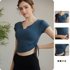 the woman is wearing a blue top and black skirt with her hands on her hips