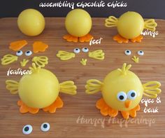 an assortment of chocolate chicks with googly eyes on a cutting board next to fake eggs