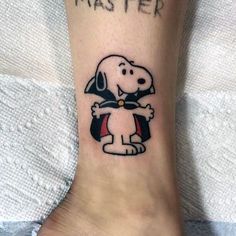 a person with a tattoo on their foot that says, i was per and has a dog