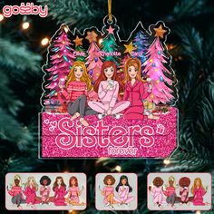 a christmas ornament with three girls in pink outfits