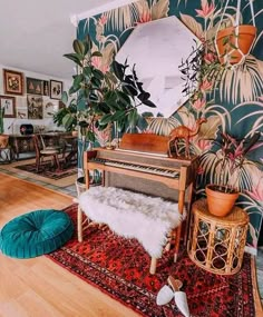 a living room filled with furniture and plants