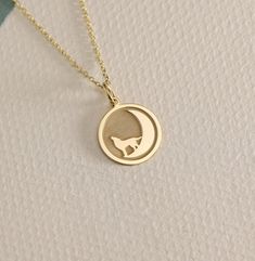 14K Real Solid Gold wolf and moon gold necklace ● Material of pendant: Solid Gold 14k ( REAL GOLD ) ● Metal Stamp: 14L ( REAL GOLD ) ● The pendant is available in 6 sizes: - 14,0 mm / 0,55 inches ( Diameter ) In the photos - 15,3 mm / 0.60 inches ( Diameter ) - 16,5 mm / 0,65 inches ( Diameter ) - 19,1 mm / 0,75 inches ( Diameter ) - 21 mm / 0,82 inches ( Diameter ) - 23 mm / 0.90 inches ( Diameter ) ( In the photos the size is 14mm / 0.55 inches Diameter ) ( Jump Ring inner diameter: 4 mm ) ● M Moon-shaped Yellow Gold Necklaces With Charms, Yellow Gold Moon Necklaces With Charms, Yellow Gold Moon-shaped Necklaces With Charms, Yellow Gold Moon Charm Necklaces, Yellow Gold Pendant Charm Necklace With Moon Phase, Yellow Gold Moon Phase Pendant Charm Necklace, Wolf And Moon, Wolf Pendant, Moon Gold