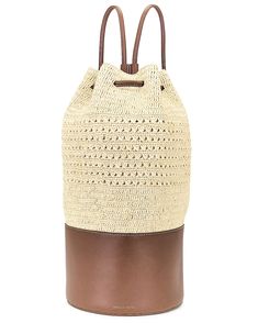 Exclusive to FWRD.  Raffia with regenerative leather trims and cotton canvas lining.  Made in USA.  Drawstring top closure.  One main compartment with interior slip pocket.  .  .  Measures approx 12" W x 15.5" H x 8" D.  .  .  .  .  .  .  .  . Travel Straw Bag With Leather Trim, Beige Straw Backpack For Travel, Summer Travel Bags With Leather Trim, Summer Bucket Bag With Leather Trim, Casual Straw Bag With Leather Trim For Vacation, Beige Straw Bag With Leather Trim For Travel, Casual Straw Bag With Leather Trim For Travel, Beige Backpack With Leather Trim For Everyday Use, Everyday Beige Backpack With Leather Trim