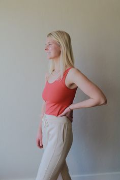 Get ready to breeze through outfit styling with this seamless tank! It's reversible, with a charming u-neck on one side and a daring v-neck on the other. And let's not forget the buttery, soft, and stretchy material - perfect for all-day comfort! One Size (XS-L) Wide shoulder straps V-neckline Back scoop neck Fitted silhouette Seamless design Buttery soft fabrication with stretch Longline hem Spring Seamless Tank Top For Everyday, Wide Straps Tank Top For Loungewear, Seamless Summer Tank Top For Loungewear, Solid Color Wide Straps Tank Top For Loungewear, Spring Loungewear Camisole With Scoop Neck, Spring Scoop Neck Camisole For Loungewear, Solid Color Tank Top With Wide Straps For Loungewear, Scoop Neck Camisole For Spring Loungewear, Casual Camisole With Seamless Construction And Wide Straps