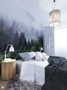 a bedroom with a large painting on the wall next to a bed and night stand