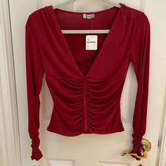 Flexible And Very Comfortable Material With Cinched Sleeves And Tastefully Low Cut Neckline. Brand New With Tags Red Stretch Top For Date Night, Stretch Red Top For Date Night, Red Long Sleeve Tops For Night Out, Low Cut Top, Cut Top, Red Shirt, Low Cut, Free People Tops, Night Out